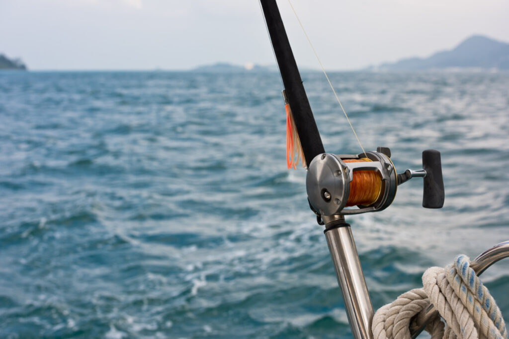 fishing rod and reel on a boat
